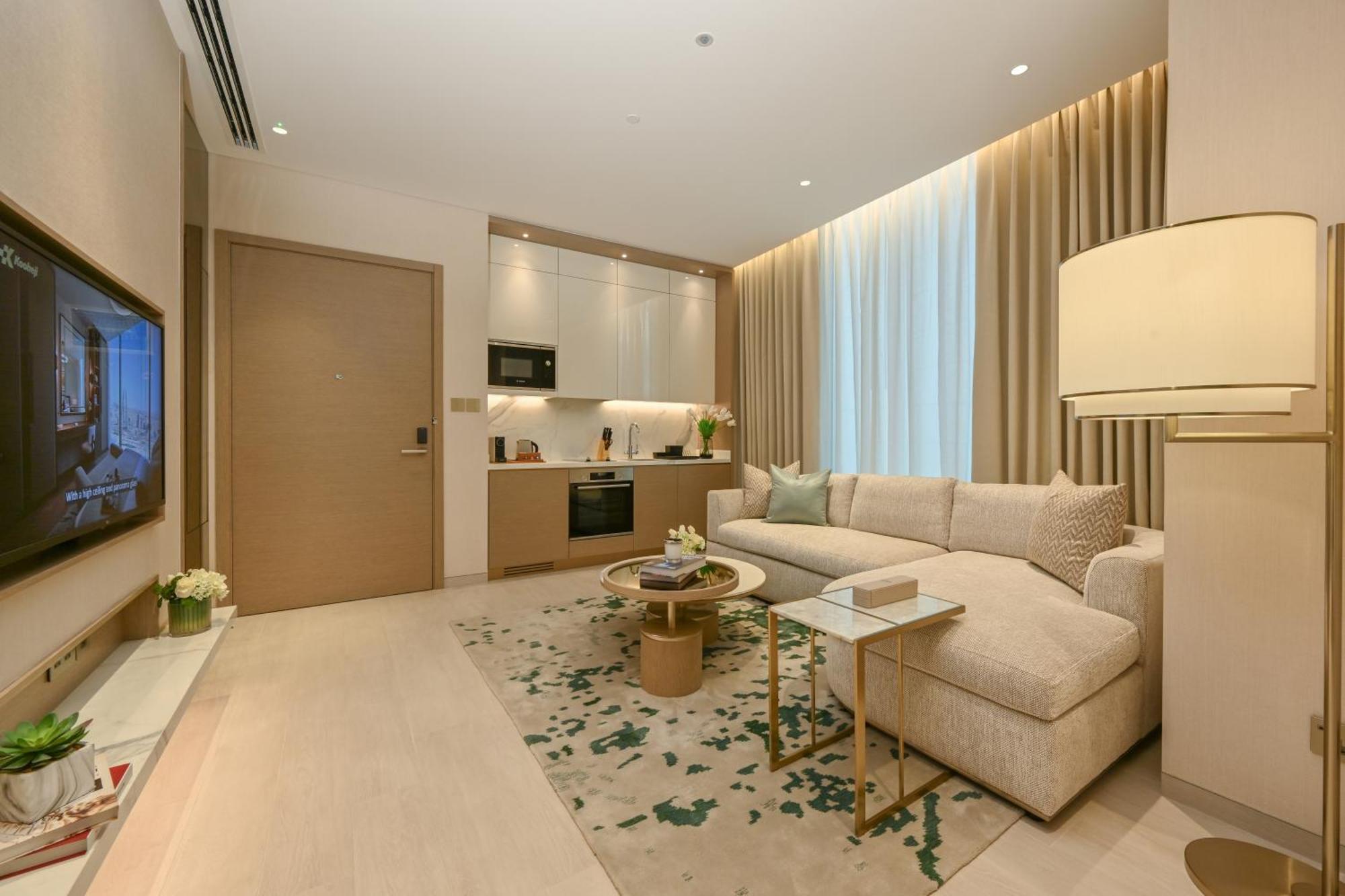 麦纳麦 Onyx Rotana酒店 外观 照片 A living room at the Ritz-Carlton, DIFC